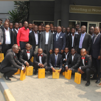 Graduating trainees and delegates pose for a snapshot with Mr. Emeka Okwuosa