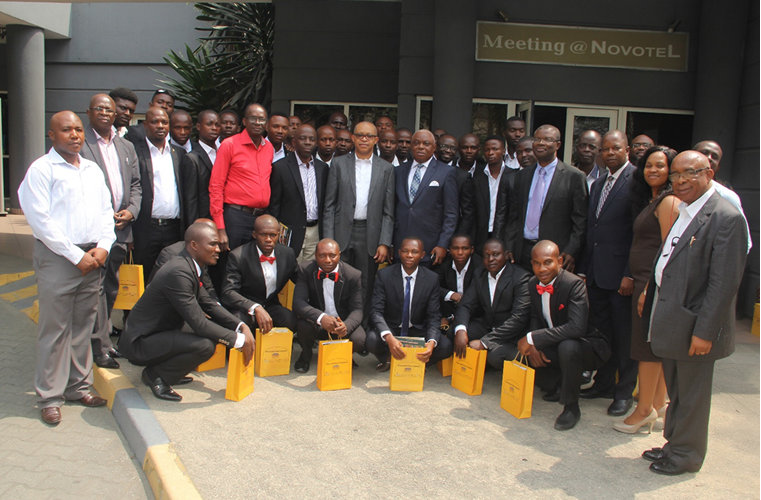 Graduating trainees and delegates pose for a snapshot with Mr. Emeka Okwuosa