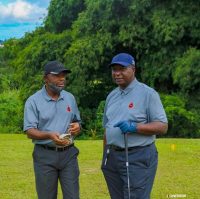 PETAN Chairman, Mr. Nicolas Odinuwe (left) poses with his Vice, Mr. Ranti Omole (right), during a game of corporate golf at the IBB Golf Club Abuja.
